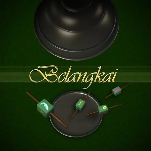 Mangkuk dan dadu Belangkai di atas meja hijau